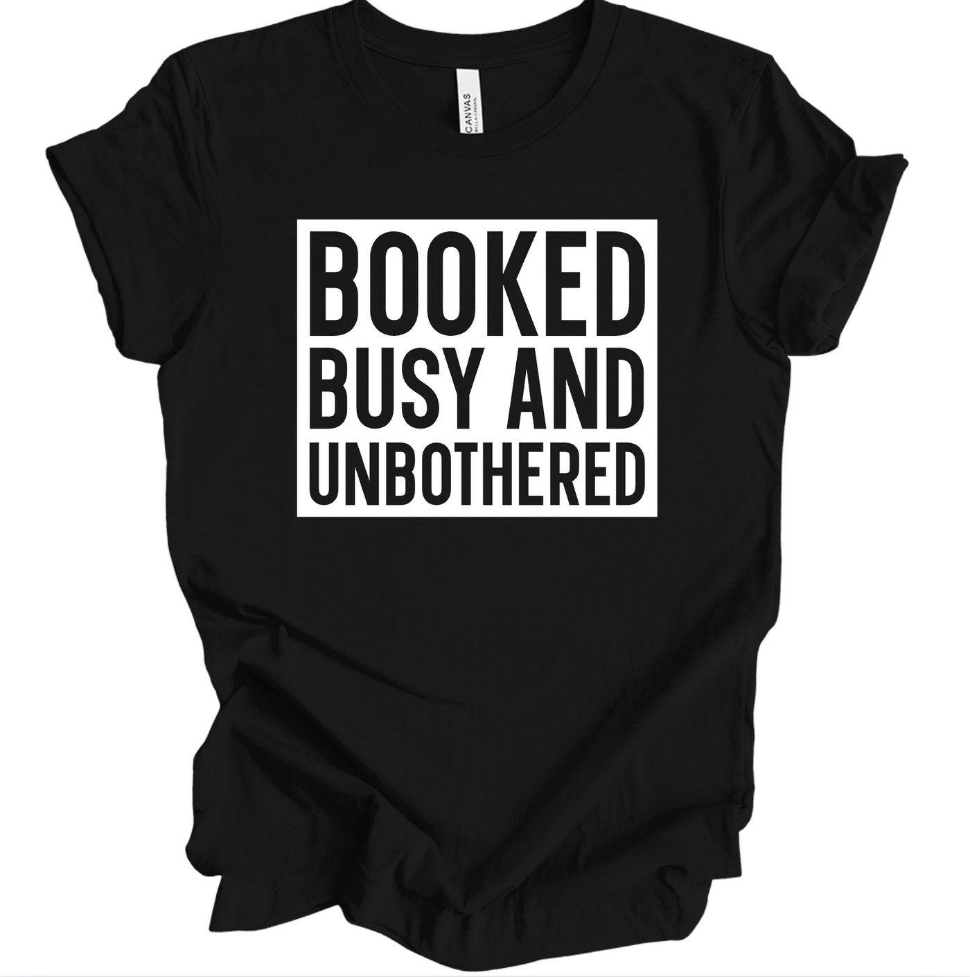 Black t-shirt with 'BOOKED BUSY AND UNBOthered' text on a white background