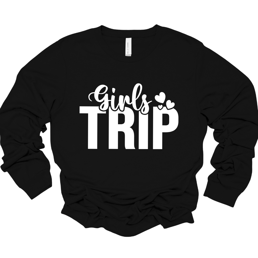 Black unisex long sleeve shirt with bold “Girls Trip” text and white heart accents.