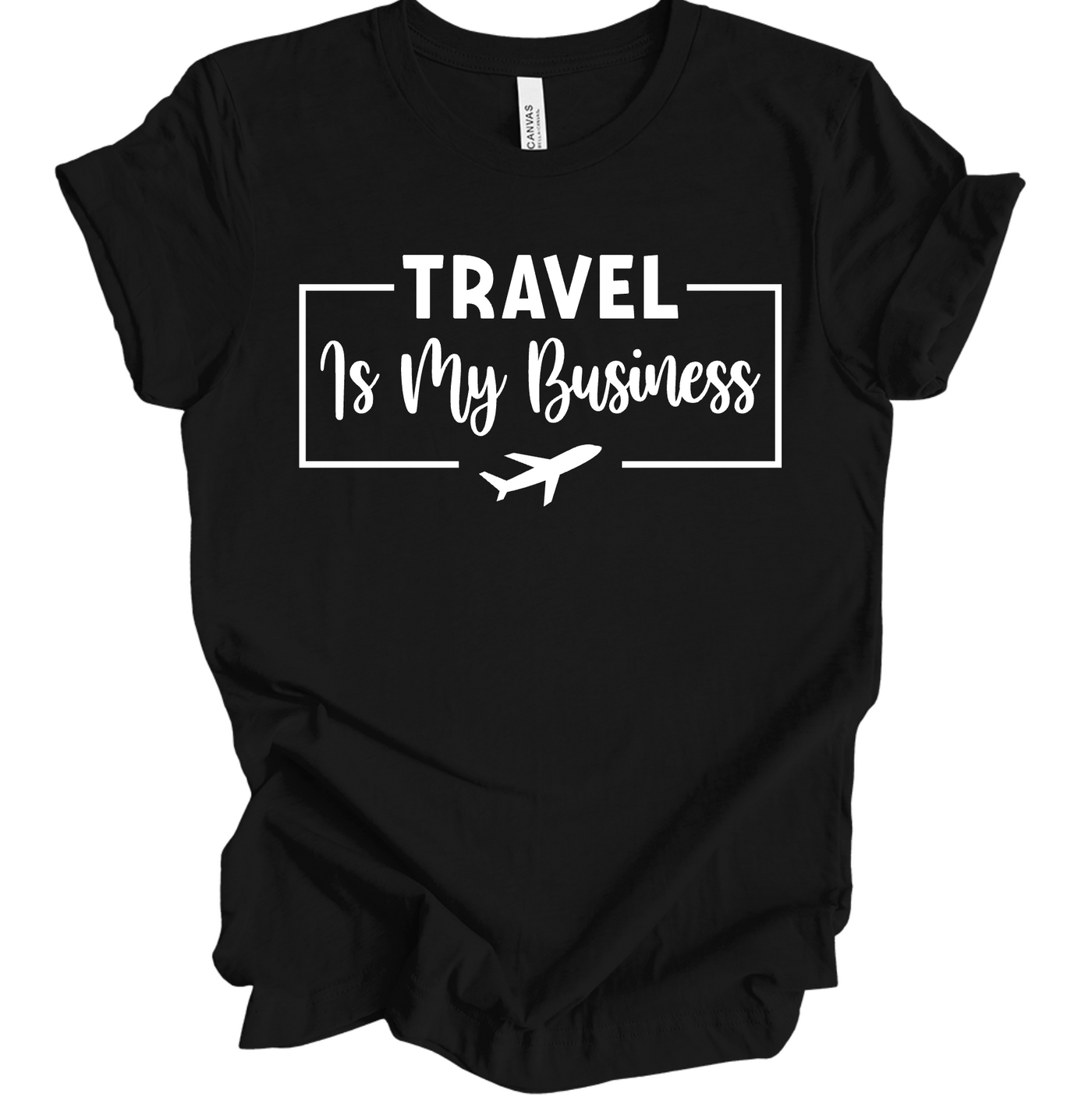 Black unisex t-shirt with white text reading "Travel Is My Business" and an airplane graphic.