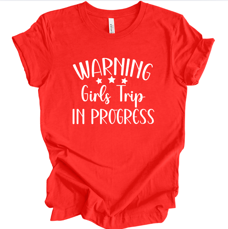 Red t-shirt with white text 'Warning Girls Trip In Progress' on a white background